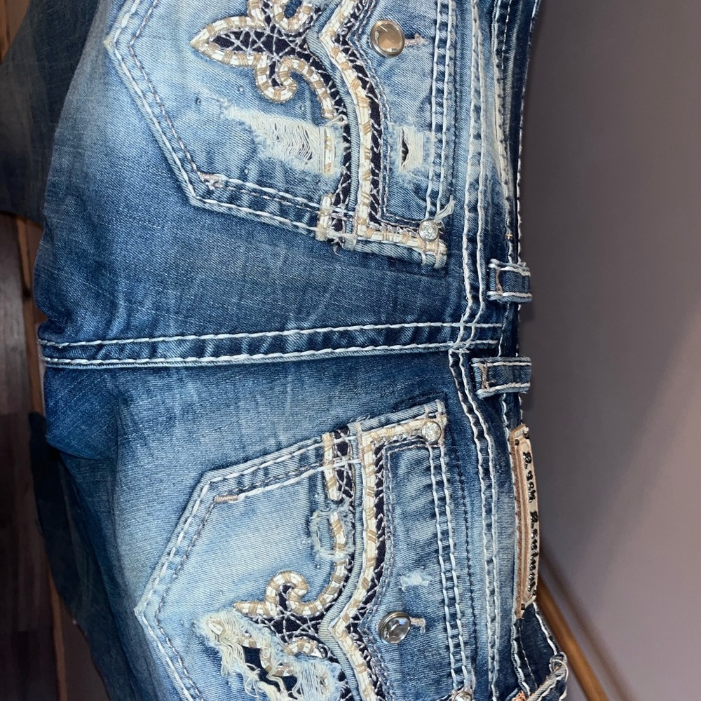 Rock Revival Blue Boot Cut Jeans with Decorative Embellishments